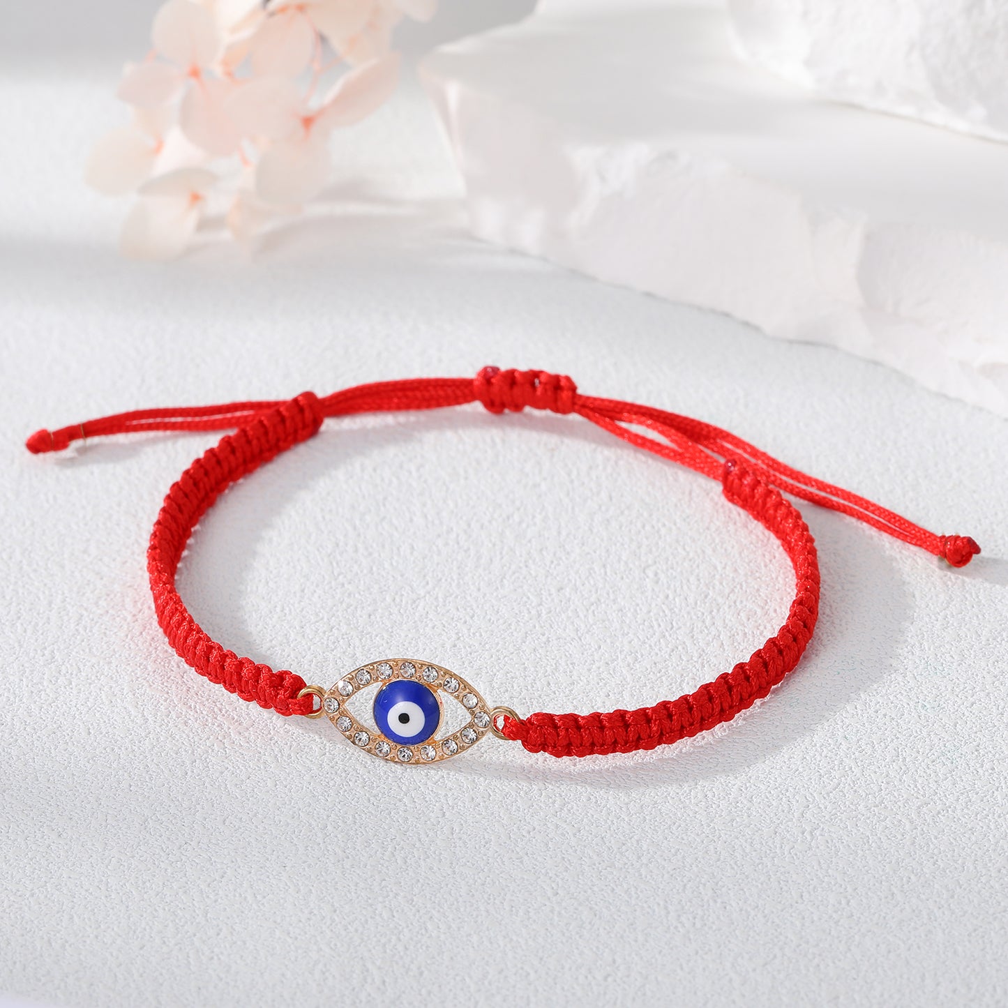Blue Cut Out Ojito with Red Braided Band
